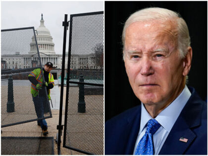 Eight-feet-tall steel fencing is put up around the U.S. Capitol the day before President J