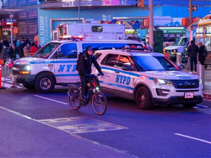 Police patrol in Times Square on February 06, 2024 in New York City. Seven migrants were a