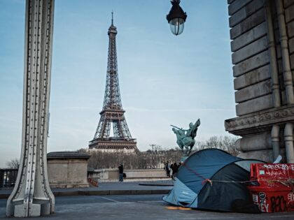 ARIS, FRANCE - JANUARY 16, 2024: A tent of a migrant under the Bir Hakeim bridge, in the b