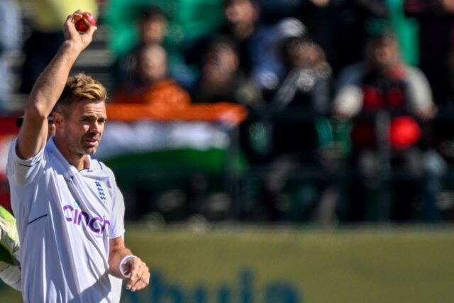 Anderson raised the ball to the crowd against the backdrop of the Himalayas as teammates g