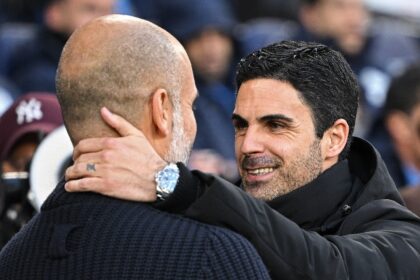 Arsenal's Mikel Arteta (right) comes up against his mentor and Manchester City boss Pep Gu