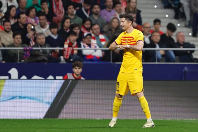 Barcelona forward Robert Lewandowski celebrates scoring his team's second goal in the rout