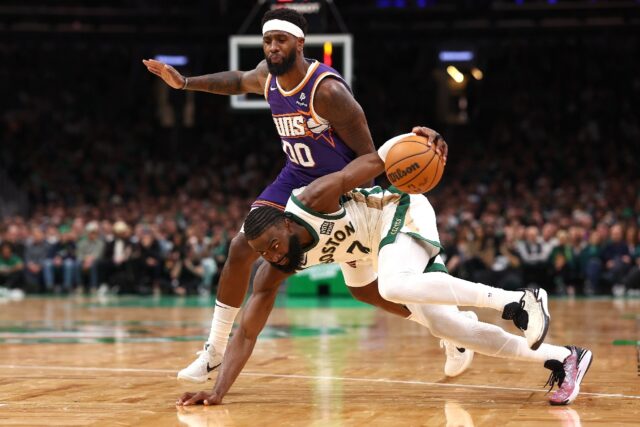 Boston's Jaylen Brown recovers the ball in Thursday's win over the Phoenix Suns