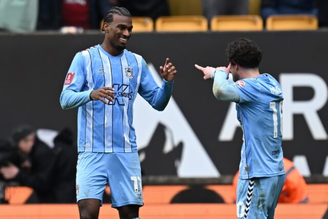 Coventry City's USA striker Haji Wright, left, celebrates with teammate Callum O'Hare afte