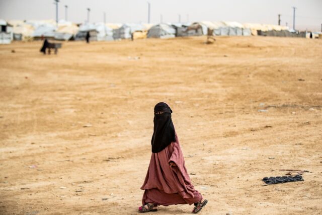 A girl walks through the al-Hol Islamic State camp in northeastern Syria