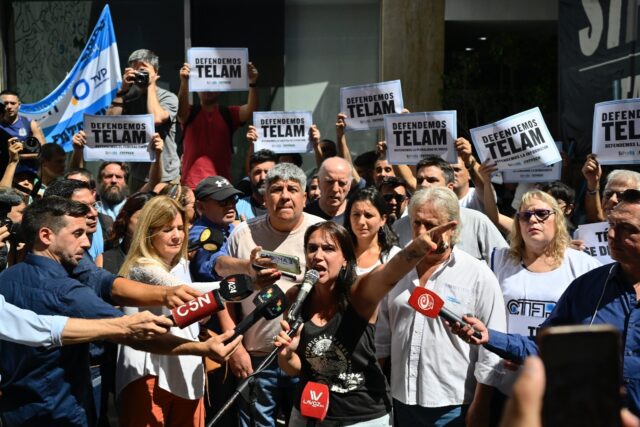 Hundreds of people protested the closure outside the Telam headquarters in central Buenos