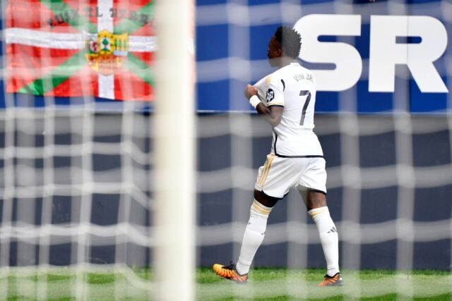 Real Madrid's Vinicius Junior celebrates scoring the opening goal in his team's rout of Os