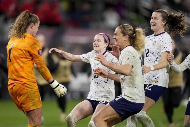 Alyssa Naeher has 3 saves in a penalty shootout over Canada and the US