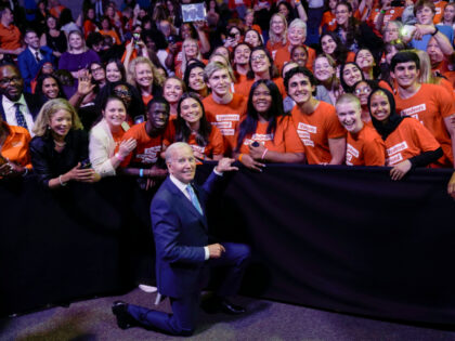 FILE - President Joe Biden poses for a photo with the Students Demand Action group after s
