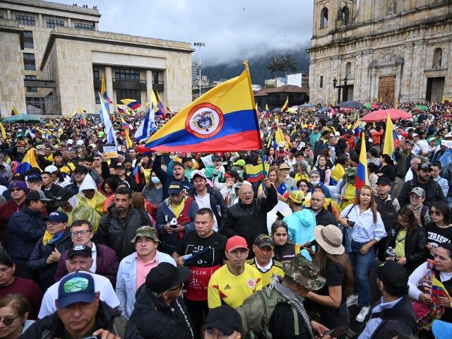 People take part in a march against the government of Colombian President Gustavo Petro ov