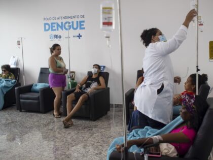 A nurse attends patients suspected of having dengue at the Carioca Health Super Center in