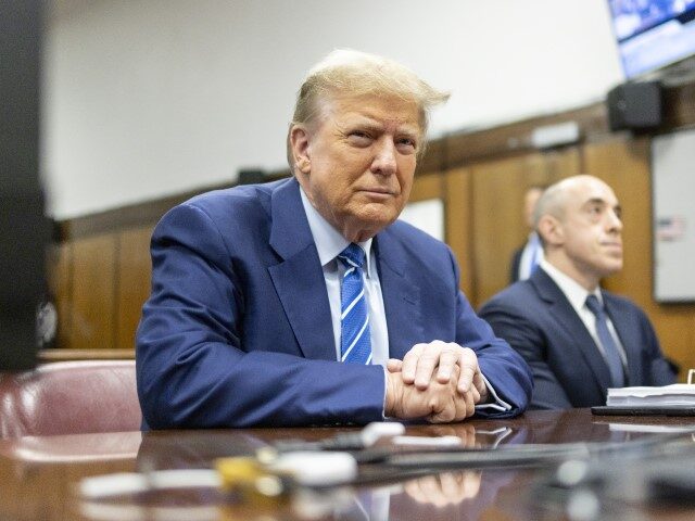 Former President Donald Trump awaits the start of proceedings on the second day of jury se