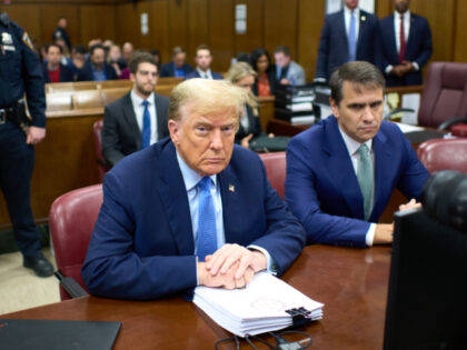 NEW YORK, NEW YORK - APRIL 26: Former U.S. President Donald Trump (L) appears in court wit