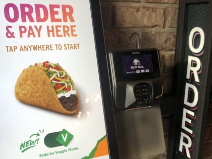 Touch Screen ordering and payment kiosk at Taco Bell fast food restaurant, Queens, New Yor