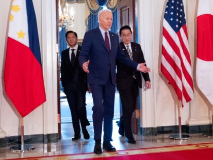 U.S. President Joe Biden holds a trilateral meeting with Japanese Prime Minister Fumio Kis