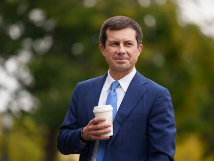 Transportation Secretary Pete Buttigieg arrives for a television interview with CNBC outsi