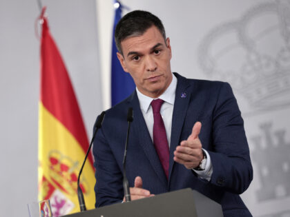 Spain's acting Prime Minister Pedro Sanchez gestures as he delivers a speech at La Moncloa