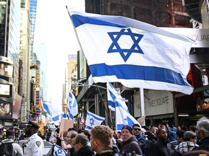 A group of pro-Israel demonstrators gather to protest people attending a Pro-Palestinian d