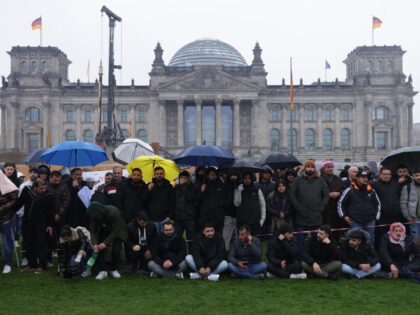 BERLIN, GERMANY - OCTOBER 19: Yazidis gather outside the Reichstag to protest against thei