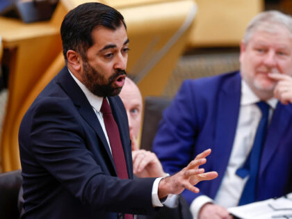 EDINBURGH, SCOTLAND - FEBRUARY 22: Scottish First Minister Humza Yousaf reacts as he answe