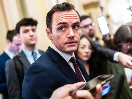 Rep. Mike Gallagher, R-Wis., talks with reporters in the U.S. Capitol after the House pass