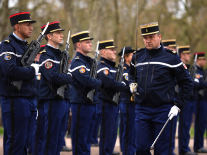Personnel from the Gendarmerie's Garde Republicaine and the British Army's Scots Guards du