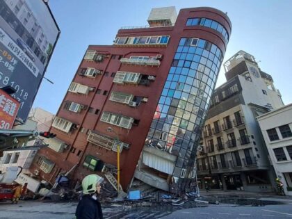 HUALIEN, CHINA - APRIL 03: A red building is partially collapsed after a powerful 7.3-magn