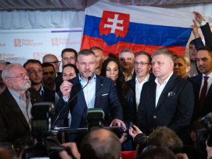 Presidential candidate Peter Pellegrini (L) and Slovak Prime Minister Robert Fico (R) spea