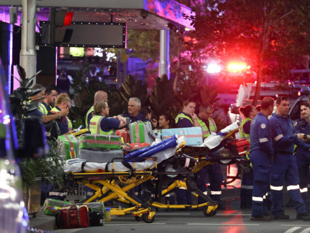 Paramedics are seen with stretchers outside the Westfield Bondi Junction shopping mall aft