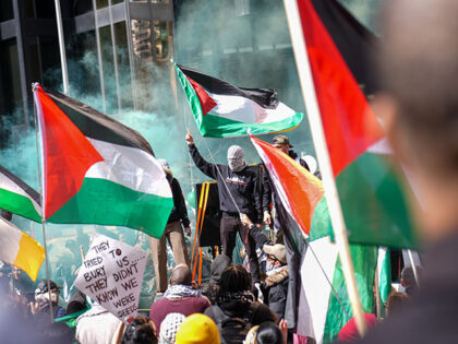 Pro-Palestinian demonstrators march during a rally in Toronto, Ontario on April 13, 2024.