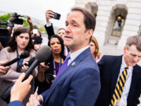 Rep. Jim Himes, D-Conn., talks with reporters outside the U.S. Capitol after the House pas