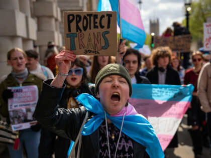 LONDON, ENGLAND - APRIL 20: Trans rights activists take part in a protest against the ban