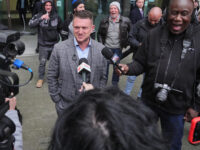 Tommy Robinson Cleared of Charges as Judge Rules Protest Ban Was ‘Unlawful’