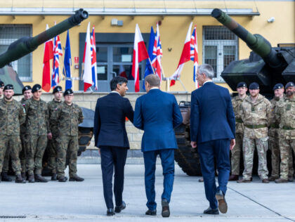 Polish Prime Minister Donald Tusk, NATO Secretary General Jens Stoltenberg, and British Pr