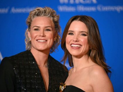 US former football player Ashlyn Harris (L) and US actress Sophia Bush arrive for the Whit