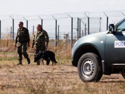 Policemen patrol the border area at Triplex Confinium, where the borders of Romania, Hunga