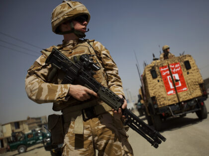 KABUL, AFGHANISTAN - AUGUST 18: British soldiers and the Afghan National Police secure the