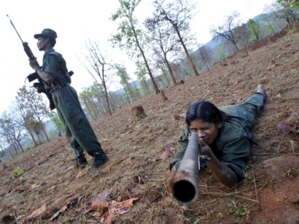 FILE - In this April 13, 2007 file photo, Maoist rebels or Naxalites, officially the Commu
