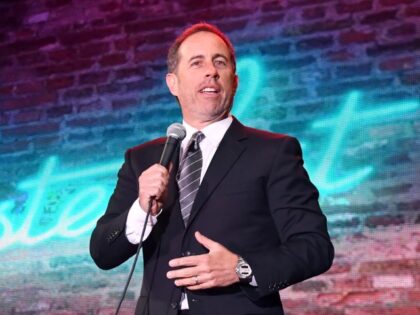 Comedian Jerry Seinfeld performs onstage at the Colossal Stage during Colossal Clusterfest