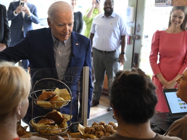 US President Joe Biden orders food at Zummo's Cafe in Scranton, Pennsylvania, before
