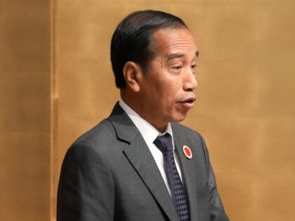 Indonesian President Joko Widodo delivers a speech at the 50th anniversary of the ASEAN-Ja