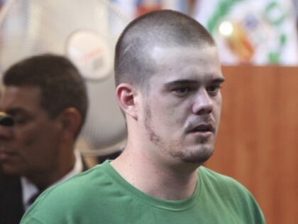 Joran van der Sloot arrives to the courtroom for his sentence at San Pedro prison in Lima,