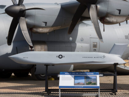 The propellers of a C-130 Hercules and a Lockheed Martin JASSM cruise missile exhibit at t