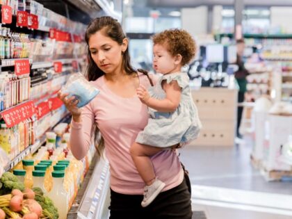 Mother and child grocery shopping