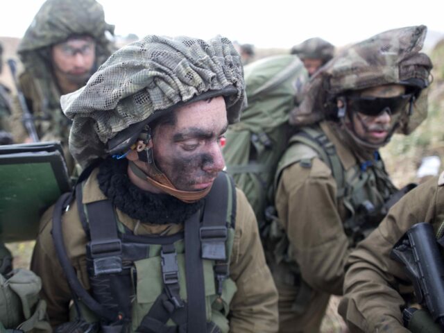 Israeli soldiers of the Jewish Ultra-Orthodox battalion "Netzah Yehuda" take par