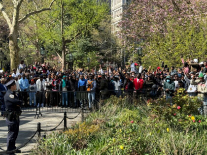 Immigrants rally at City Hall Park outside City Hall in New York on Tuesday, April 16, 202