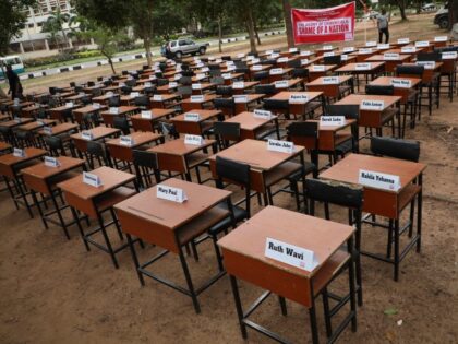 Names of the remaining Chibok schoolgirls are displayed with their desk on April 14, 2019,