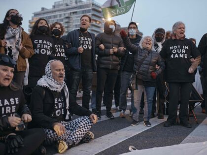 Protesters block traffic during a pro-Palestinian demonstration demanding a permanent ceas