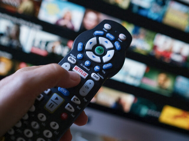 In this illustration photo taken on July 19, 2022 the Netflix logo is seen on a TV remote