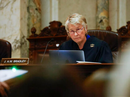Wisconsin Supreme Court Justice Ann Walsh Bradley listens to arguments during a redistrict